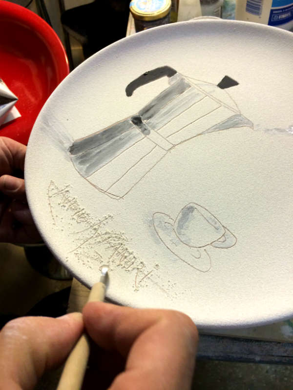 The making of Italian Summers plate Moka Amore. Exclusive ceramic plate by Italian Summers.The signing of the plate by Claudio