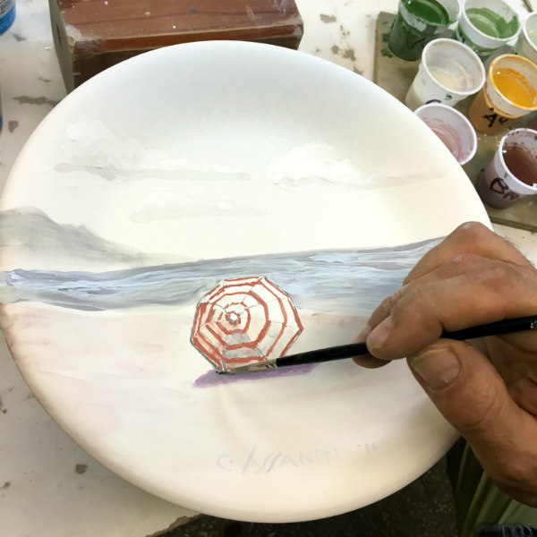 Italian Summers plate Ombrellone, Italian beach, the making of. Handpainted by claudio assandri, design by Lisa van de Pol. Italian Style ceramic plates by Italian Summers design